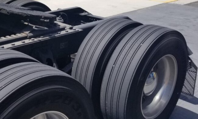 Close-up of a truck's rear wheels