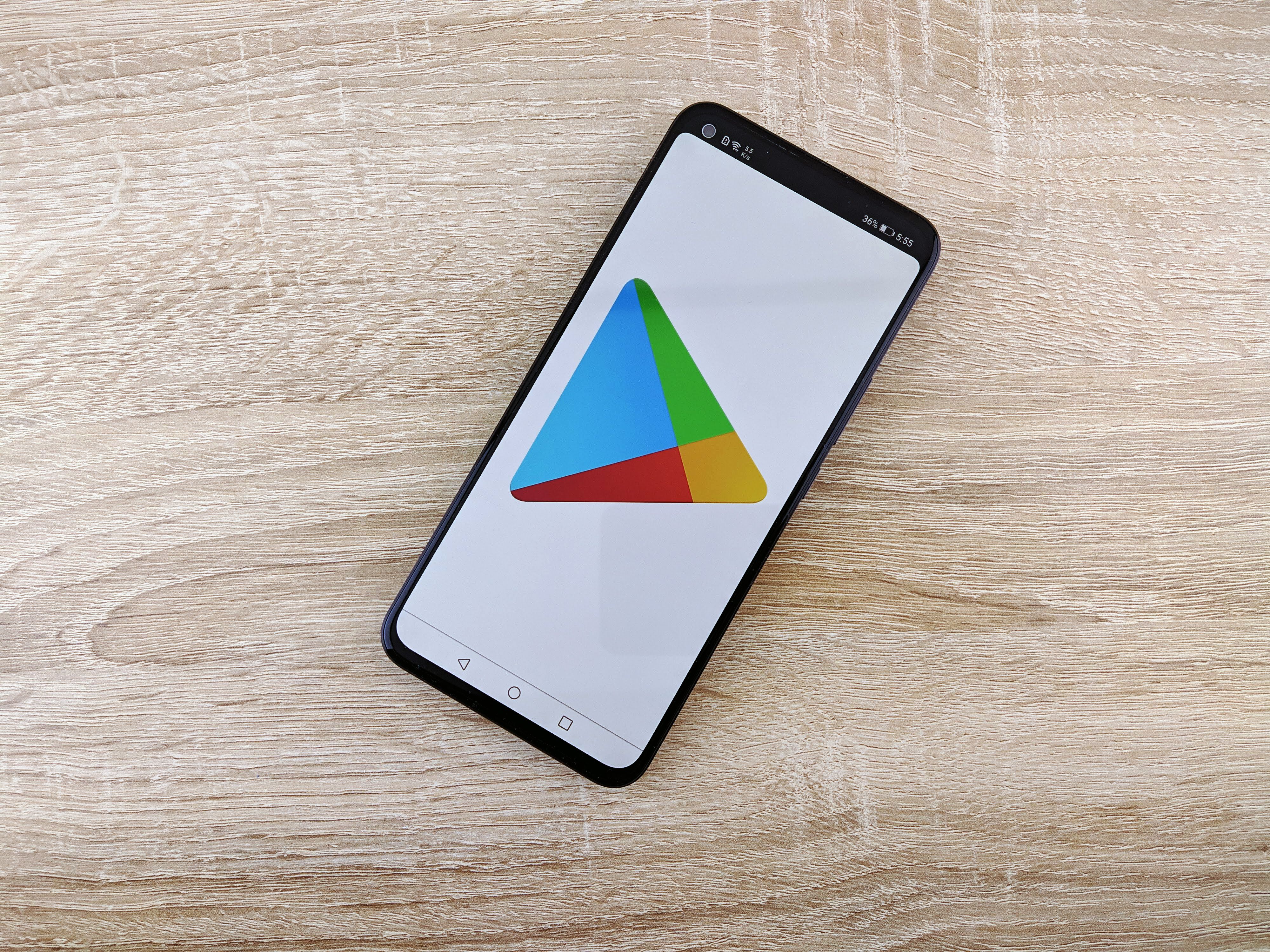 Smartphone showing an app store screen before downloading a gaming app