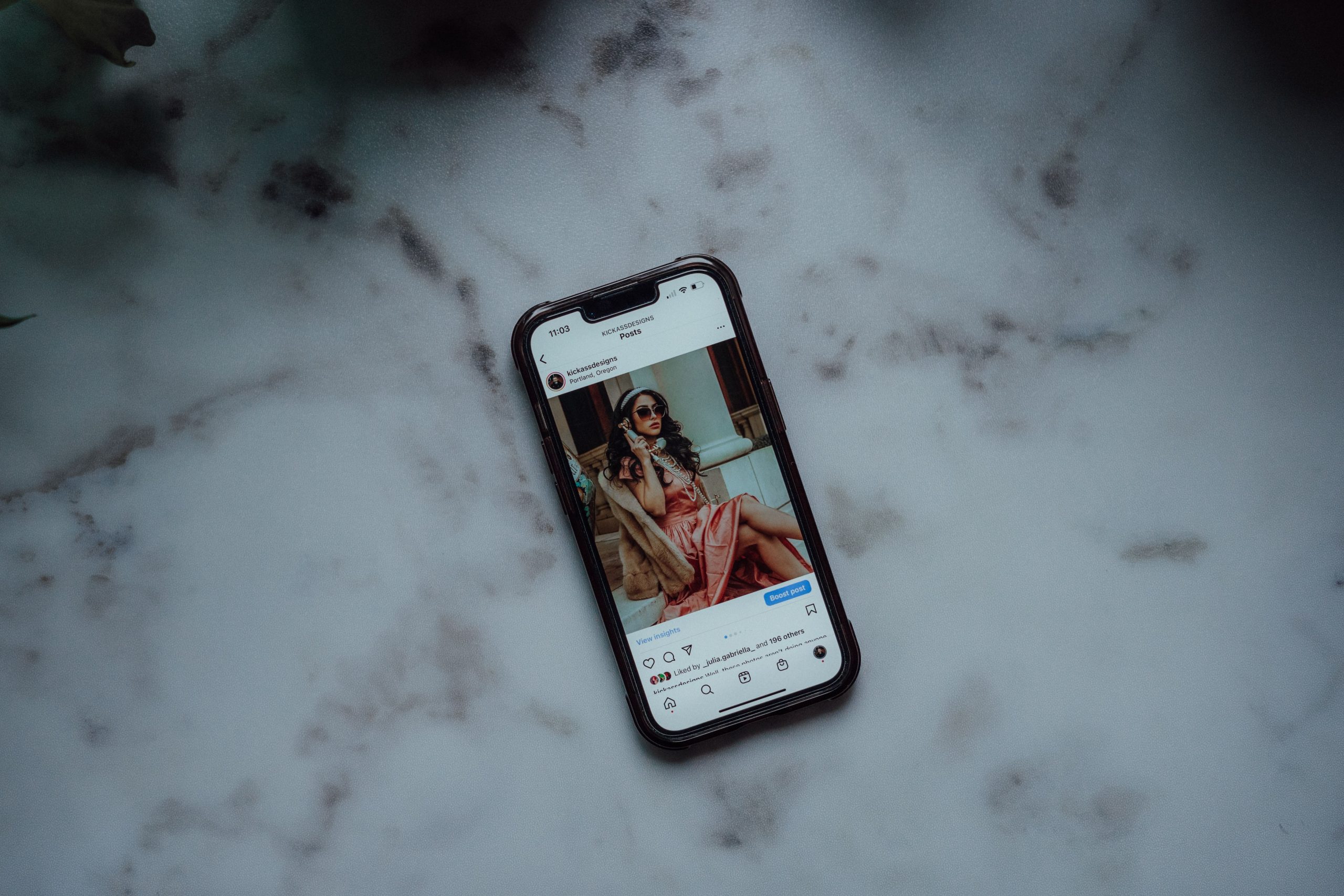 Smartphone displaying an Instagram post, representing the post a creator wants more people to see.